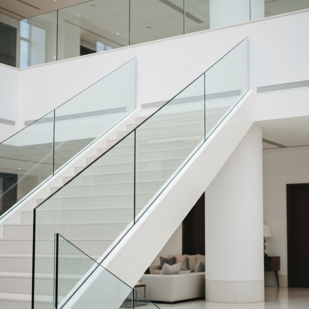 Structural glass railing in a commercial atrium